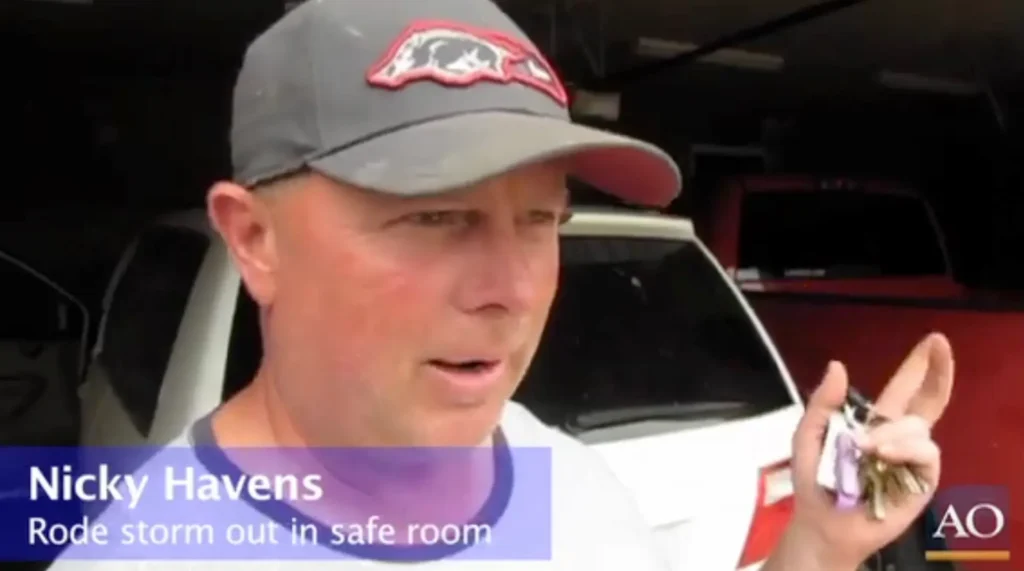 Man holding keys during news interview