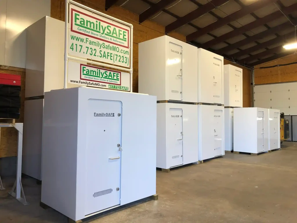 White FamilySAFE storm shelters in warehouse showroom
