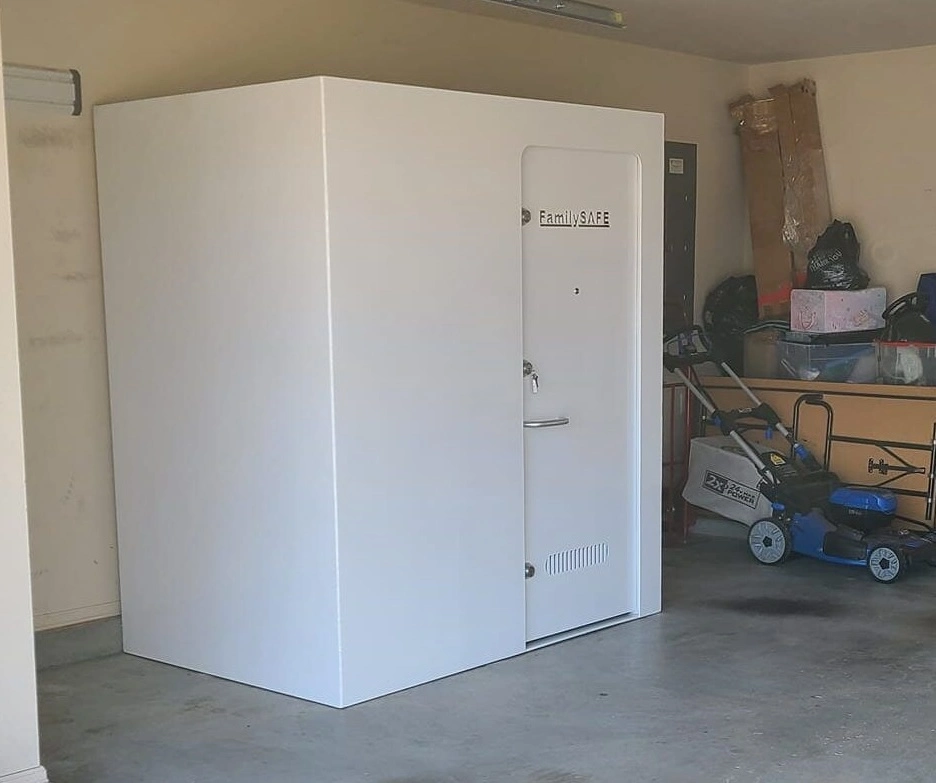 White storm shelter in a garage