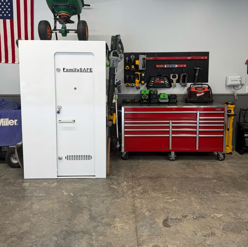 White FamilySAFE safe in organized garage workshop