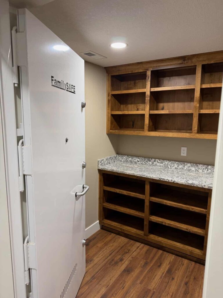 Walk-in safe room with wooden shelves